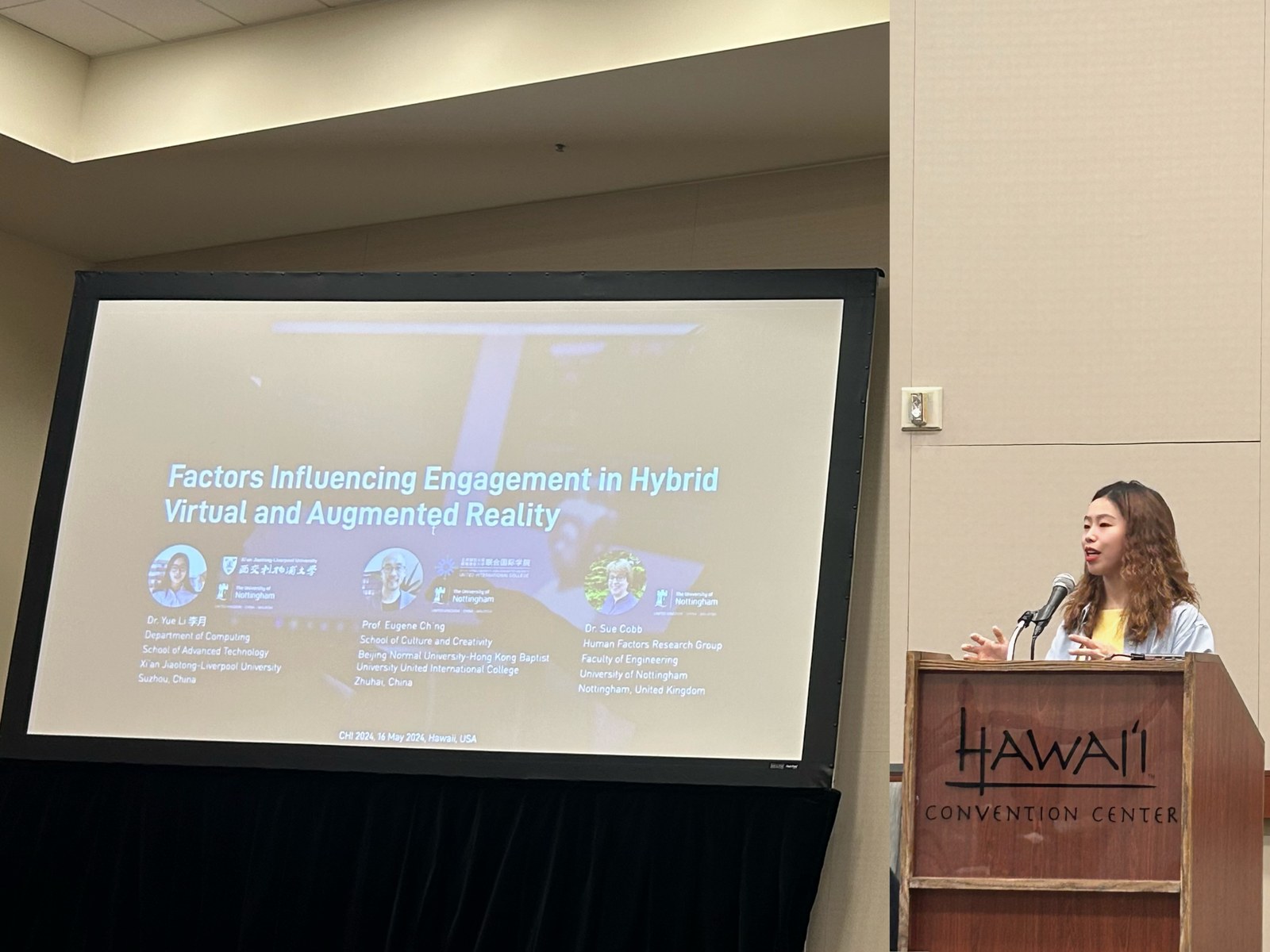 Presentation on engagement in hybrid virtual and augmented reality at CHI 2024.